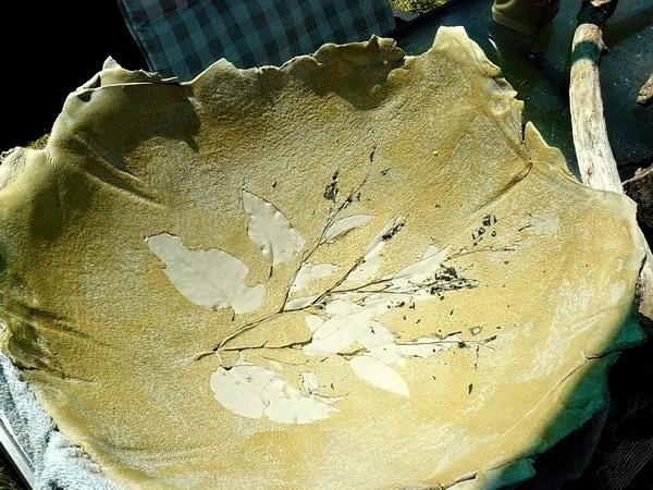 This is what it looked like when I peeled the leaves away. I should have let the leaves burn away in the kiln, because by removing them I weakened the bowl.
